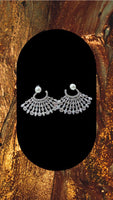 Silver plated diamond and pearl studded earrings