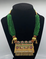 Choker style Gold plated pendant with green moti string without earrings