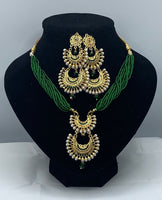Short green moti with gold plated pendant set with earrings