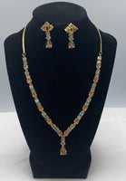 Short gold plated set with high quality Zarconia diamonds of white and topaz colour