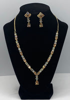 Short gold plated set with high quality Zarconia diamonds of white and topaz colour
