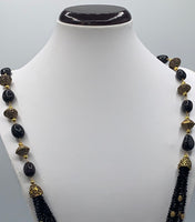 Long black crystal beaded necklace set with gold plated metal oxidized pcs and earrings