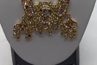 Long beaded necklace with gold plated pendant adorned with multi coloured diamonds