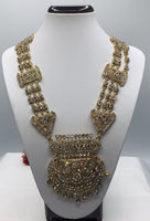 RANI HAR - Long gold plated ethnic necklace adorned with multi coloured diamonds