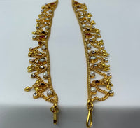 Gold plated adorned with coloured stones and moti Payal one size