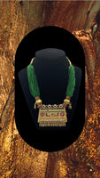 Choker style Gold plated pendant with green moti string without earrings