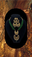 Short green moti with gold plated pendant set with earrings