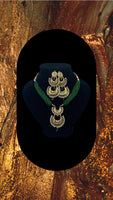 Short green moti with gold plated pendant set with earrings