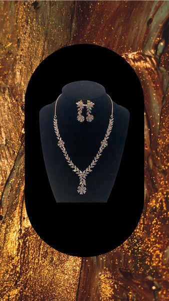 Short gold plated set with high quality Zarconia diamonds of white and topaz colour