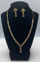 Short gold plated set with high quality Zarconia diamonds of white and topaz colour