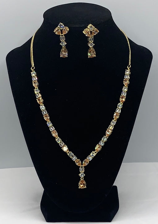 Short gold plated set with high quality Zarconia diamonds of white and topaz colour