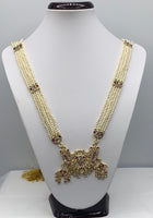 Long beaded necklace with gold plated pendant adorned with multi coloured diamonds