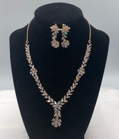 Rose gold plated necklace set with matching earrings adorned with high quality Zarconia white diamonds.