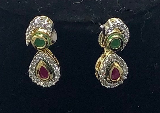 Gold plated with high quality emerald , ruby and diamond studded necklace set with matching earrings