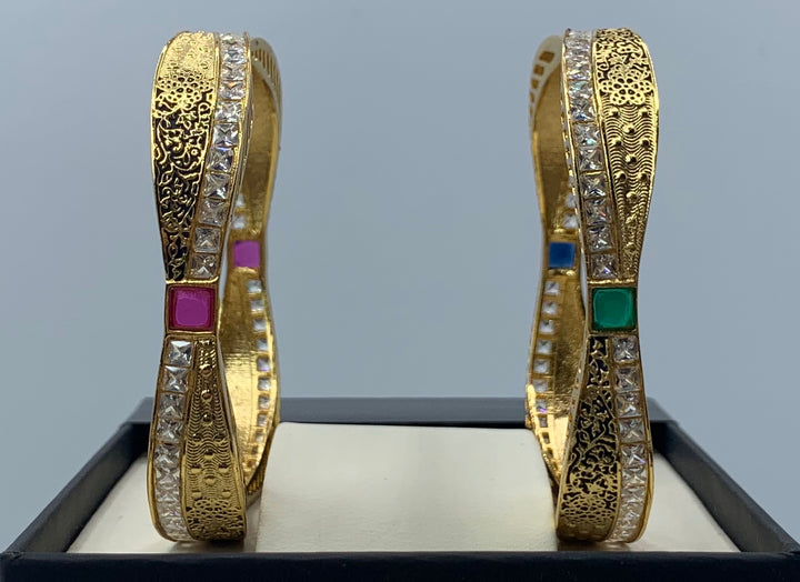 Oxidized Gold plated bangles adorned with ruby, emerald and white stones