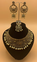 Gold plated choker style necklace set with matching earrings and head piece adorned with cream colour beads