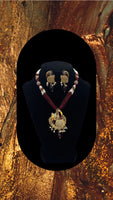 Short gold plated peacock pendant set with moti and bead work with matching earrings