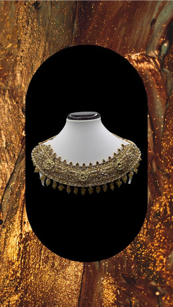 Gold plated choker style necklace adorned with polki kundan and high quality beads